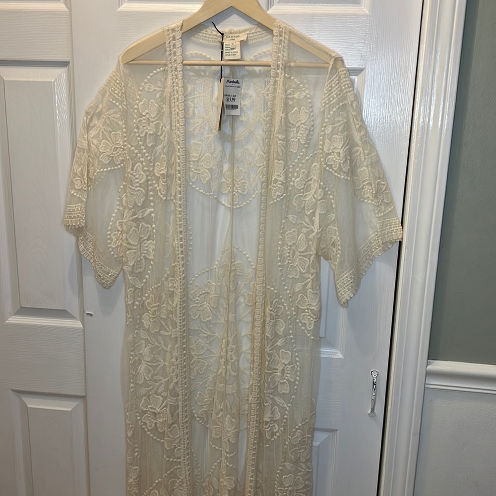 Woman’s swim cover up size M